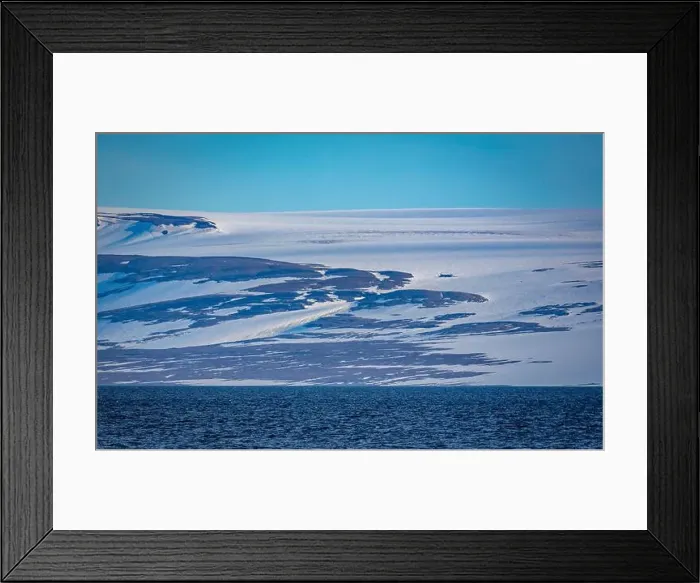 Framed Print : rocks waterfall small iceberg and glacier at the Alkefjellet between Spitsbergen and Nordaustlandet on Svalbard, Norway Framed Print : rocks waterfall small iceberg and glacier at the Alkefjellet between Spitsbergen and Nordaustlandet on Svalbard, Norway