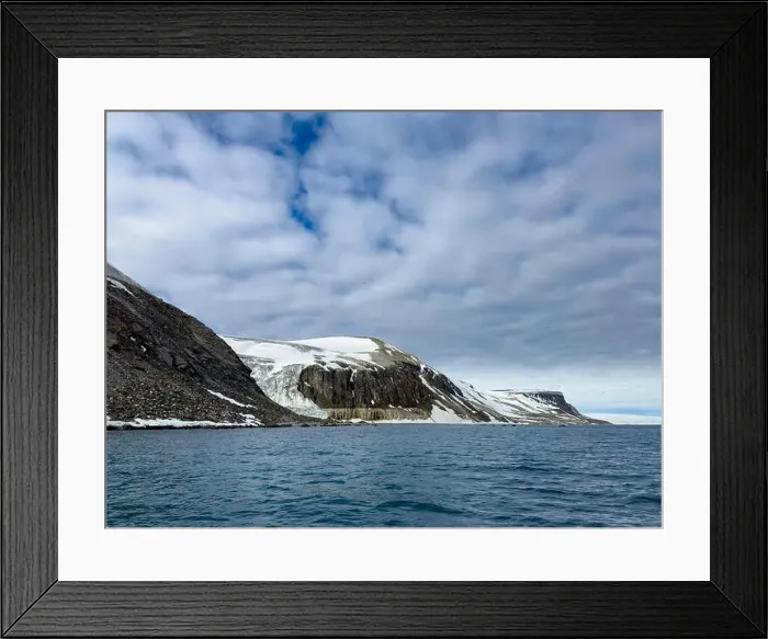 Framed Print : rocks waterfall small iceberg and glacier at the Alkefjellet between Spitsbergen and Nordaustlandet on Svalbard, Norway Framed Print : rocks waterfall small iceberg and glacier at the Alkefjellet between Spitsbergen and Nordaustlandet on Svalbard, Norway