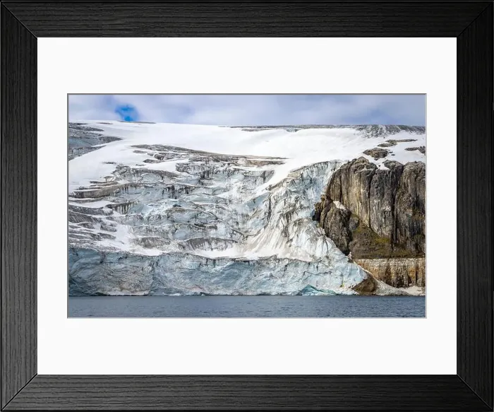 Framed Print : rocks waterfall small iceberg and glacier at the Alkefjellet between Spitsbergen and Nordaustlandet on Svalbard, Norway Framed Print : rocks waterfall small iceberg and glacier at the Alkefjellet between Spitsbergen and Nordaustlandet on Svalbard, Norway