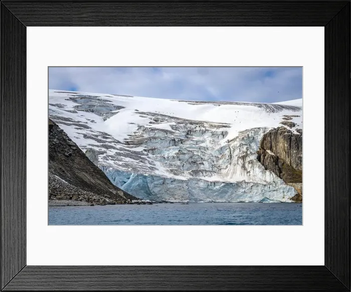 Framed Print : rocks waterfall small iceberg and glacier at the Alkefjellet between Spitsbergen and Nordaustlandet on Svalbard, Norway Framed Print : rocks waterfall small iceberg and glacier at the Alkefjellet between Spitsbergen and Nordaustlandet on Svalbard, Norway