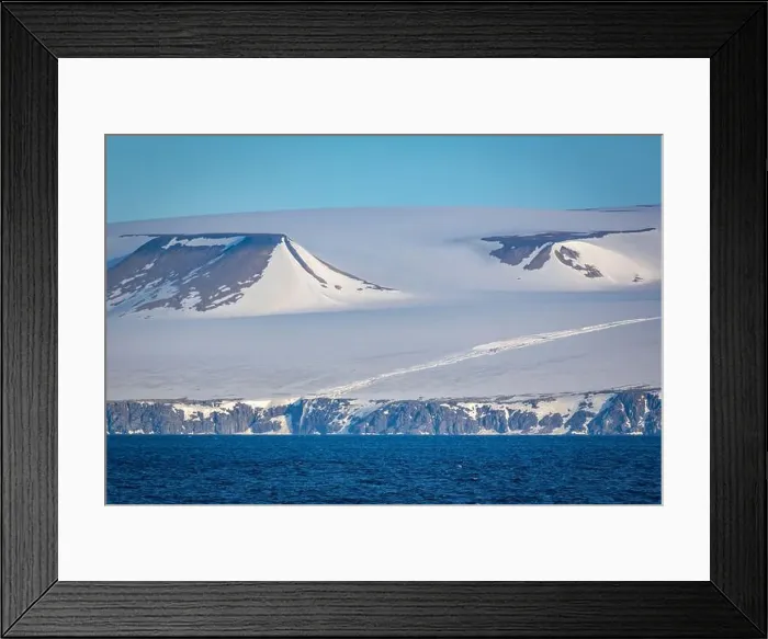 Framed Print : rocks waterfall small iceberg and glacier at the Alkefjellet between Spitsbergen and Nordaustlandet on Svalbard, Norway Framed Print : rocks waterfall small iceberg and glacier at the Alkefjellet between Spitsbergen and Nordaustlandet on Svalbard, Norway