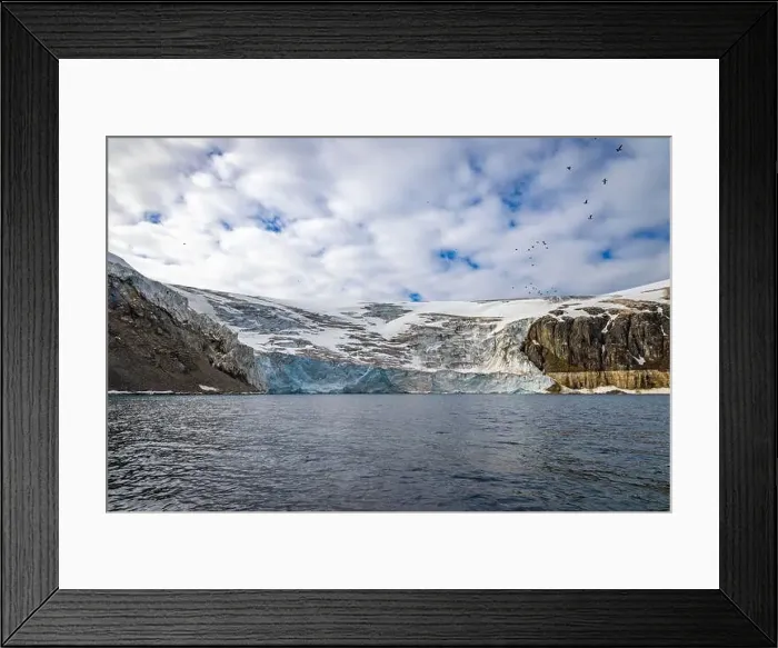 Framed Print : rocks waterfall small iceberg and glacier at the Alkefjellet between Spitsbergen and Nordaustlandet on Svalbard, Norway Framed Print : rocks waterfall small iceberg and glacier at the Alkefjellet between Spitsbergen and Nordaustlandet on Svalbard, Norway