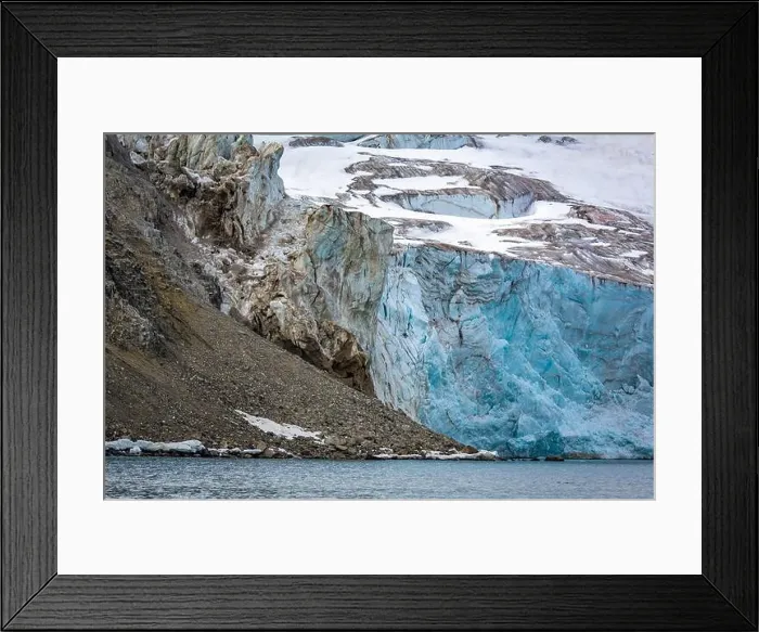 Framed Print : rocks waterfall small iceberg and glacier at the Alkefjellet between Spitsbergen and Nordaustlandet on Svalbard, Norway Framed Print : rocks waterfall small iceberg and glacier at the Alkefjellet between Spitsbergen and Nordaustlandet on Svalbard, Norway