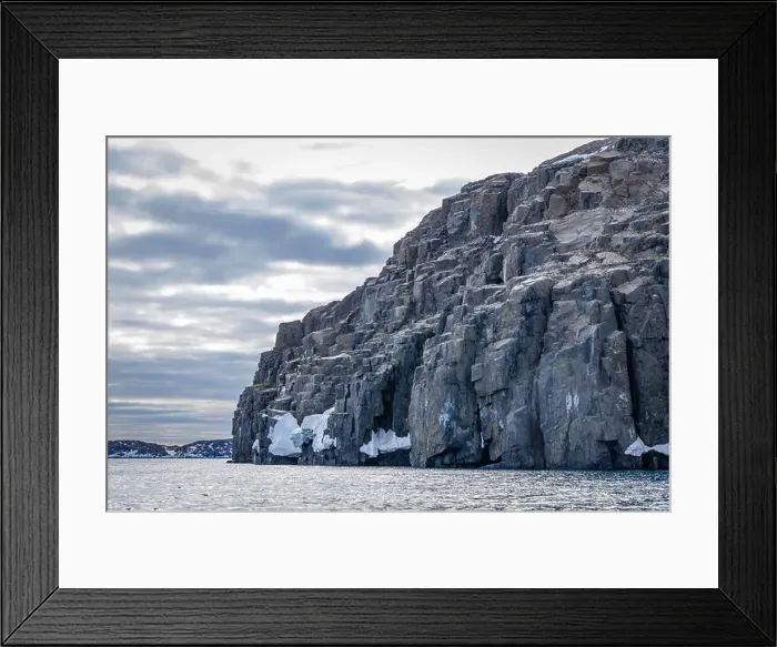 Framed Print : rocks waterfall small icebergs at the Alkefjellet between Spitsbergen and Nordaustlandet on Svalbard, Norway Framed Print : rocks waterfall small icebergs at the Alkefjellet between Spitsbergen and Nordaustlandet on Svalbard, Norway