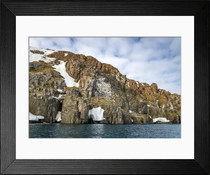 Framed Print : rocks waterfall small icebergs at the Alkefjellet between Spitsbergen and Nordaustlandet on Svalbard, Norway Framed Print : rocks waterfall small icebergs at the Alkefjellet between Spitsbergen and Nordaustlandet on Svalbard, Norway