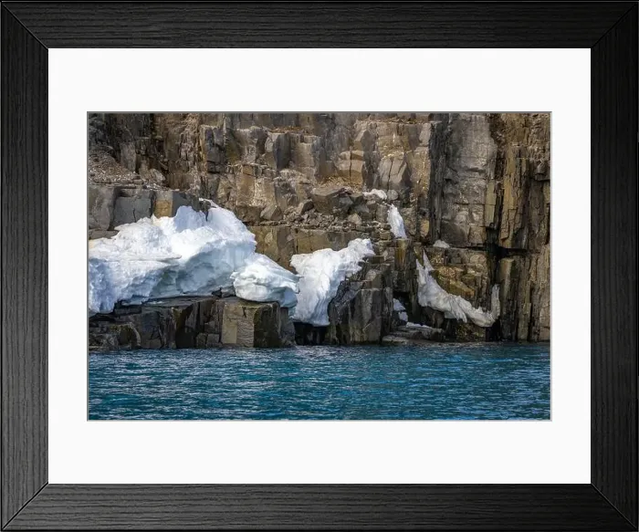 Framed Print : rocks waterfall small iceberg and glacier at the Alkefjellet between Spitsbergen and Nordaustlandet on Svalbard, Norway Framed Print : rocks waterfall small iceberg and glacier at the Alkefjellet between Spitsbergen and Nordaustlandet on Svalbard, Norway