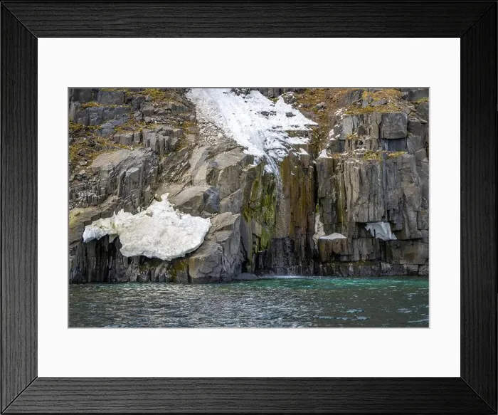 Framed Print : rocks waterfall small iceberg and glacier at the Alkefjellet between Spitsbergen and Nordaustlandet on Svalbard, Norway Framed Print : rocks waterfall small iceberg and glacier at the Alkefjellet between Spitsbergen and Nordaustlandet on Svalbard, Norway