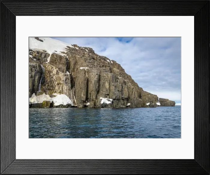 Framed Print : rocks waterfall small icebergs at the Alkefjellet between Spitsbergen and Nordaustlandet on Svalbard, Norway Framed Print : rocks waterfall small icebergs at the Alkefjellet between Spitsbergen and Nordaustlandet on Svalbard, Norway