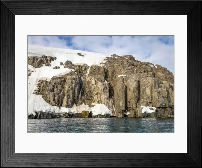 Framed Print : rocks waterfall small icebergs at the Alkefjellet between Spitsbergen and Nordaustlandet on Svalbard, Norway Framed Print : rocks waterfall small icebergs at the Alkefjellet between Spitsbergen and Nordaustlandet on Svalbard, Norway