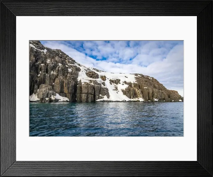 Framed Print : rocks waterfall small iceberg and glacier at the Alkefjellet between Spitsbergen and Nordaustlandet on Svalbard, Norway Framed Print : rocks waterfall small iceberg and glacier at the Alkefjellet between Spitsbergen and Nordaustlandet on Svalbard, Norway