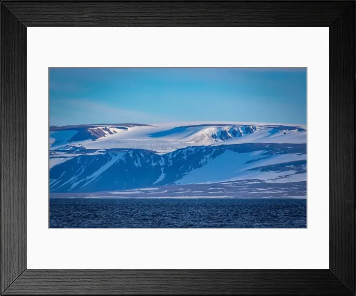 Framed Print : rocks waterfall small iceberg and glacier at the Alkefjellet between Spitsbergen and Nordaustlandet on Svalbard, Norway Framed Print : rocks waterfall small iceberg and glacier at the Alkefjellet between Spitsbergen and Nordaustlandet on Svalbard, Norway