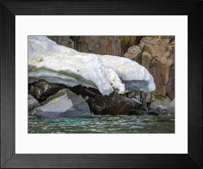 Framed Print : rocks waterfall small iceberg and glacier at the Alkefjellet between Spitsbergen and Nordaustlandet on Svalbard, Norway Framed Print : rocks waterfall small iceberg and glacier at the Alkefjellet between Spitsbergen and Nordaustlandet on Svalbard, Norway
