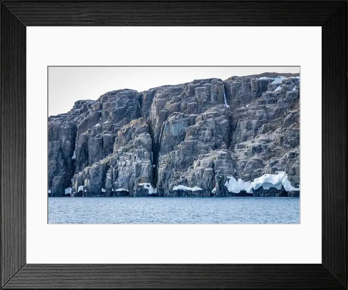 Framed Print : rocks waterfall small icebergs at the Alkefjellet between Spitsbergen and Nordaustlandet on Svalbard, Norway Framed Print : rocks waterfall small icebergs at the Alkefjellet between Spitsbergen and Nordaustlandet on Svalbard, Norway