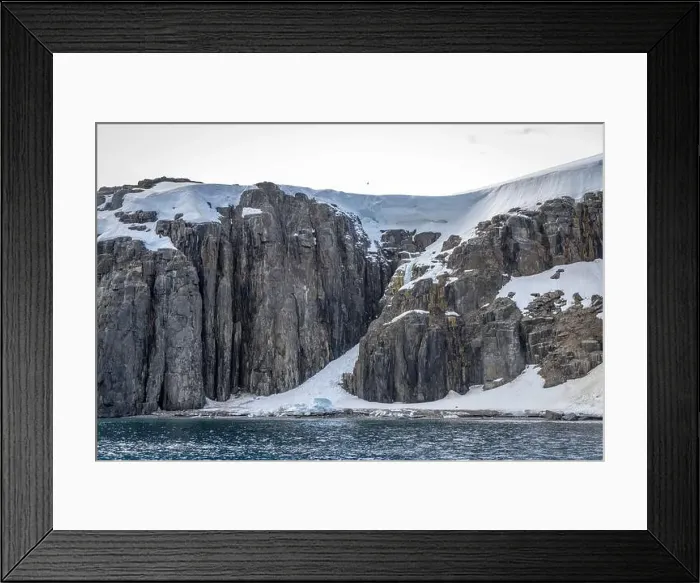 Framed Print : rocks waterfall small iceberg and glacier at the Alkefjellet between Spitsbergen and Nordaustlandet on Svalbard, Norway Framed Print : rocks waterfall small iceberg and glacier at the Alkefjellet between Spitsbergen and Nordaustlandet on Svalbard, Norway