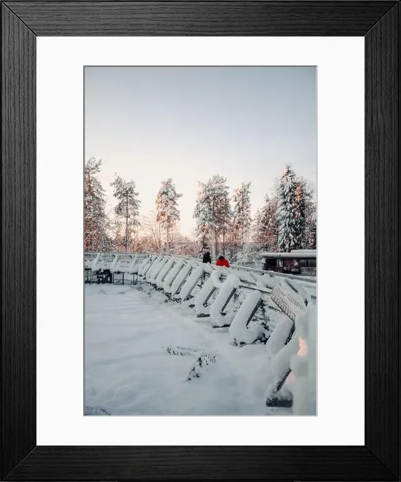 Framed Print : Couple on footbridge in snowy forest in wildlife park in Ranua, Lapland Framed Print : Couple on footbridge in snowy forest in wildlife park in Ranua, Lapland