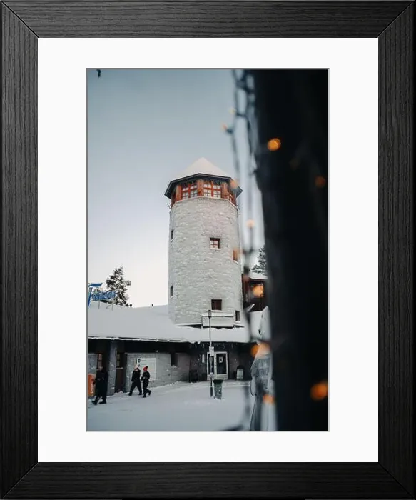 Framed Print : Snowy wildlife park entrance tower behind fairy lights in Ranua, Lapland Framed Print : Snowy wildlife park entrance tower behind fairy lights in Ranua, Lapland