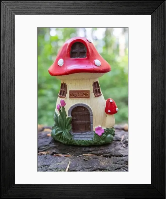 Framed Print : Collection of birdhouses made by children and placed on fallen trees in the forest Framed Print : Collection of birdhouses made by children and placed on fallen trees in the forest