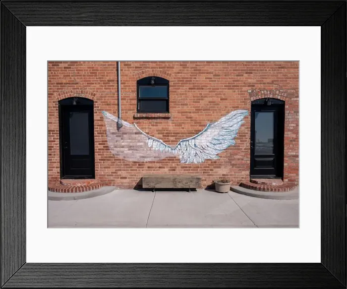 Framed Print : Nanton, Alberta - March 30, 2024: Old brick storefront in downtown Granum with a selfie spot Framed Print : Nanton, Alberta - March 30, 2024: Old brick storefront in downtown Granum with a selfie spot