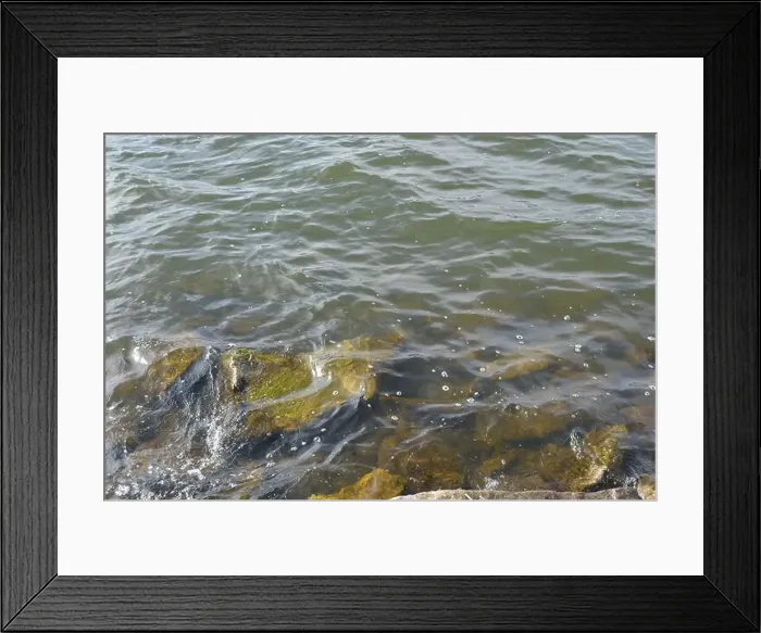Framed Print : Large stones, brown and gray granite are located on the shore and bottom of the reservoir Framed Print : Large stones, brown and gray granite are located on the shore and bottom of the reservoir