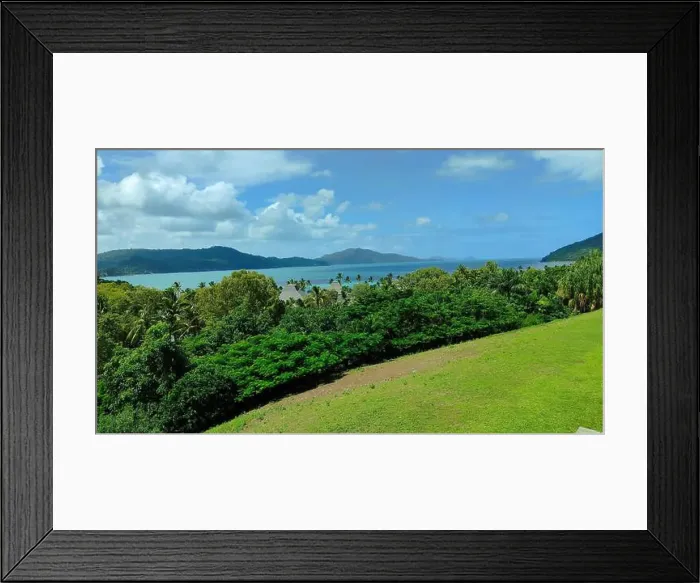 Framed Print : Hamilton Island panorama: lush green hills roll down to a turquoise ocean, creating a picture-perfect tropical paradise Framed Print : Hamilton Island panorama: lush green hills roll down to a turquoise ocean, creating a picture-perfect tropical paradise