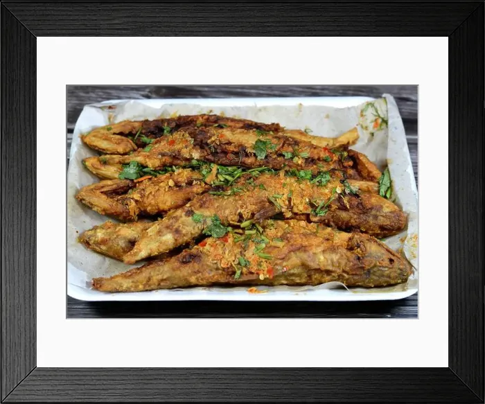 Framed Print : Fried Saurida undosquamis, the brushtooth lizardfish