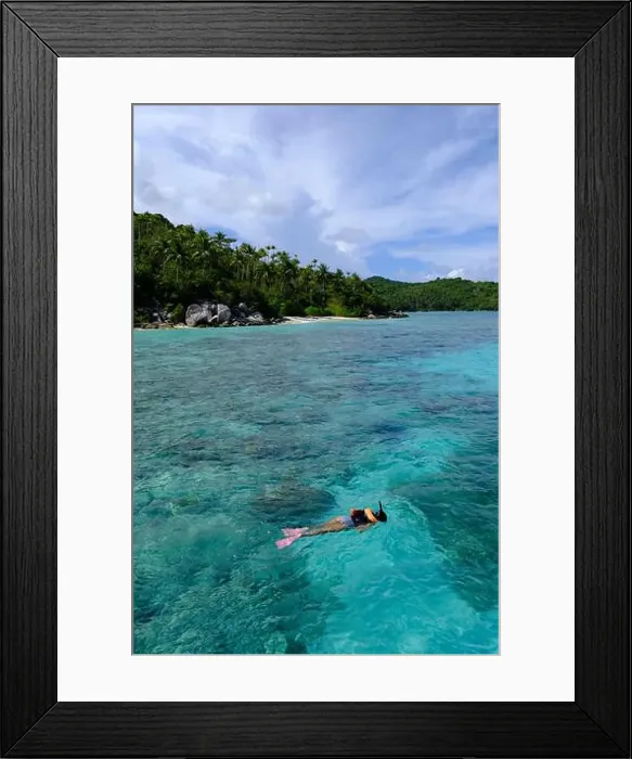 Framed Print : Indonesia Anambas Islands - Female snorkeller in coral reef vertical Framed Print : Indonesia Anambas Islands - Female snorkeller in coral reef vertical