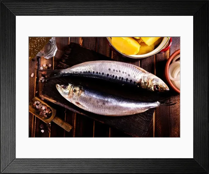 Framed Print : Herring or Baltic herring with salt on dark backgruond Framed Print : Herring or Baltic herring with salt on dark backgruond