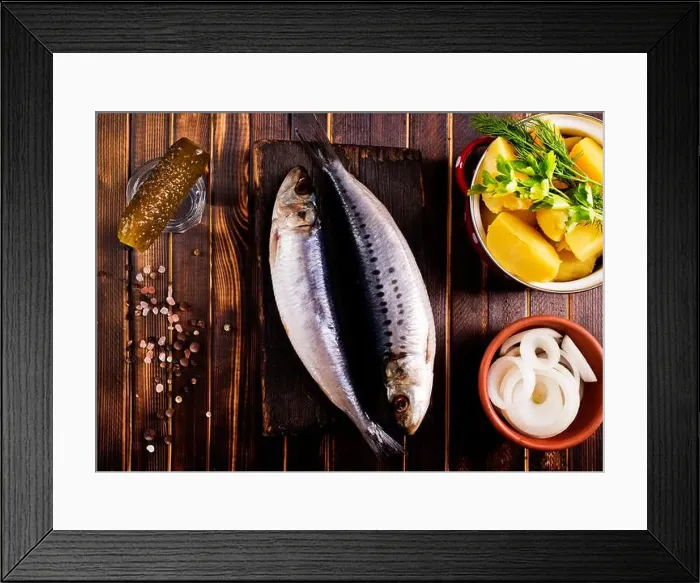 Framed Print : Herring or Baltic herring with salt on dark backgruond Framed Print : Herring or Baltic herring with salt on dark backgruond