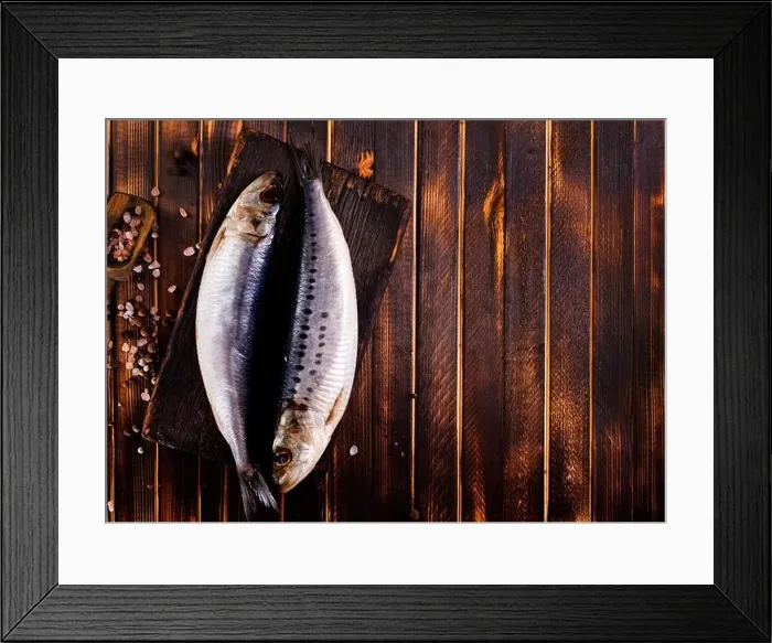 Framed Print : Herring or Baltic herring with salt on dark backgruond Framed Print : Herring or Baltic herring with salt on dark backgruond