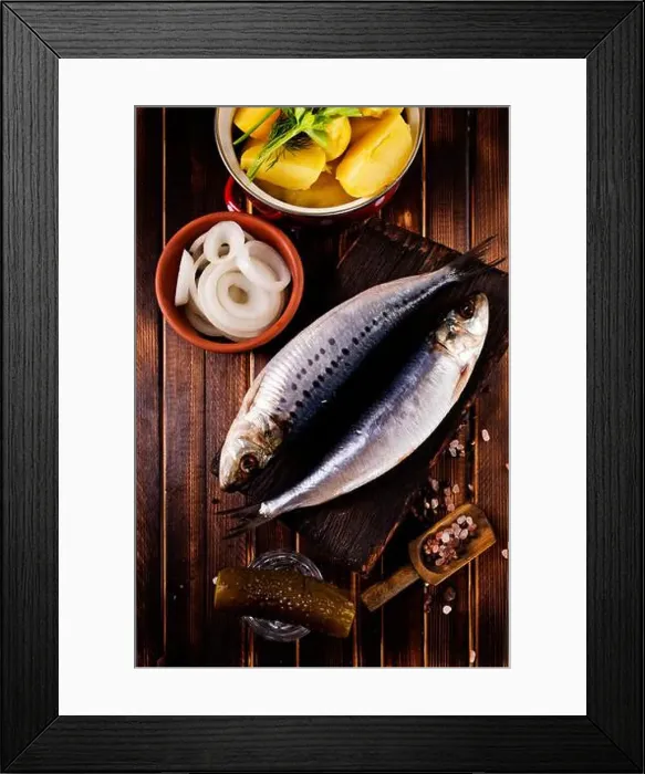 Framed Print : Herring or Baltic herring with salt on dark backgruond Framed Print : Herring or Baltic herring with salt on dark backgruond