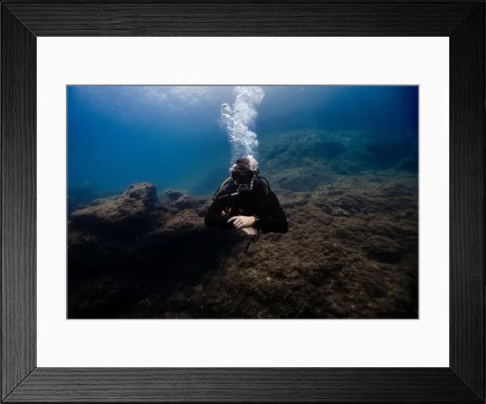 Framed Print : A scuba diver, unrecognizable due to his gear Framed Print : A scuba diver, unrecognizable due to his gear
