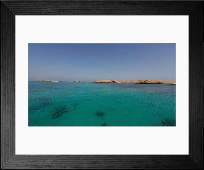 Framed Print : Photography of small islands sanctuary in Oman near Muscat shot from a boat during spring sunny day Framed Print : Photography of small islands sanctuary in Oman near Muscat shot from a boat during spring sunny day