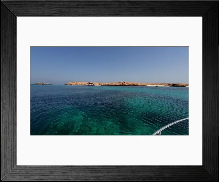 Framed Print : Photography of small islands sanctuary in Oman near Muscat shot from a boat during spring sunny day Framed Print : Photography of small islands sanctuary in Oman near Muscat shot from a boat during spring sunny day