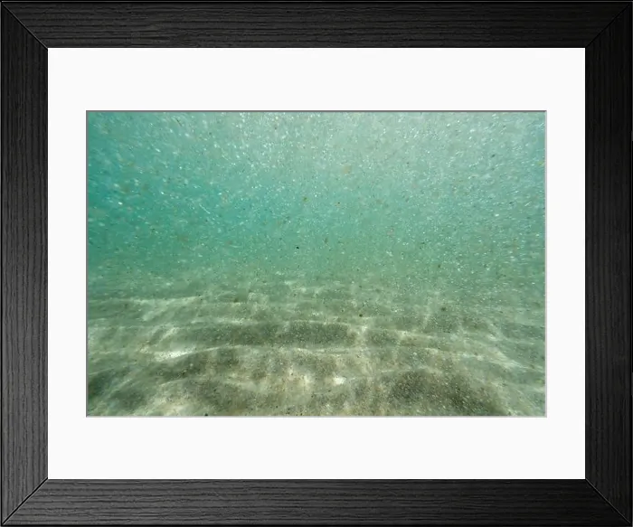 Framed Print : Underwater floating particles of sand. High quality photo Framed Print : Underwater floating particles of sand. High quality photo