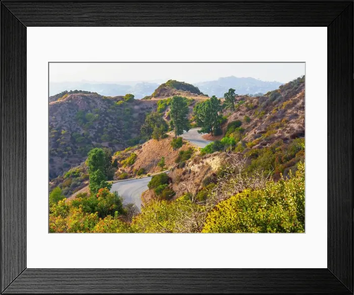 Framed Print : Scenic road winding through Mount Hollywood with surrounding greenery and hills Framed Print : Scenic road winding through Mount Hollywood with surrounding greenery and hills