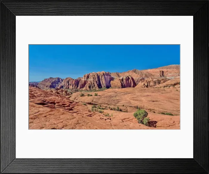 Framed Print : The Red Mountains rising behind the petrified sand dunes at Snow Canyon State Park, Southern Utah Framed Print : The Red Mountains rising behind the petrified sand dunes at Snow Canyon State Park, Southern Utah