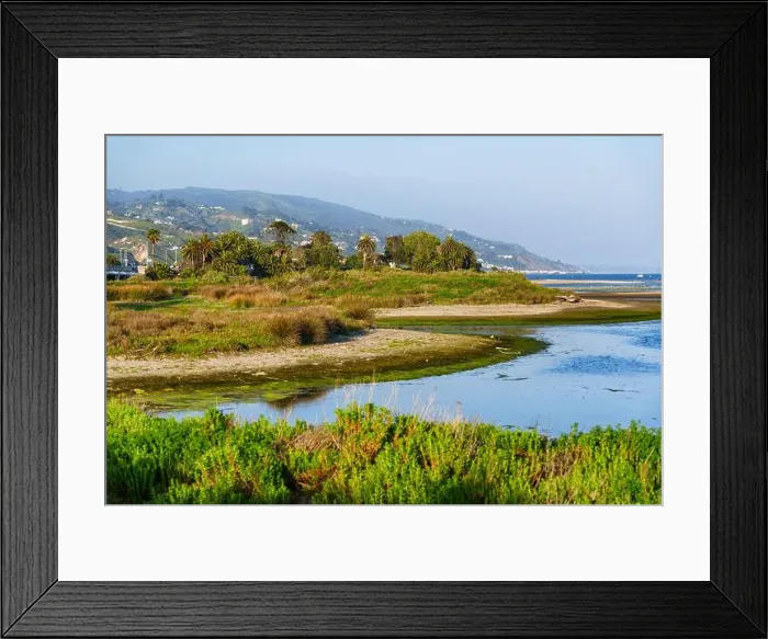 Framed Print : Scenic view of Malibu Lagoon with lush vegetation and mountains in background. California landscape Framed Print : Scenic view of Malibu Lagoon with lush vegetation and mountains in background. California landscape