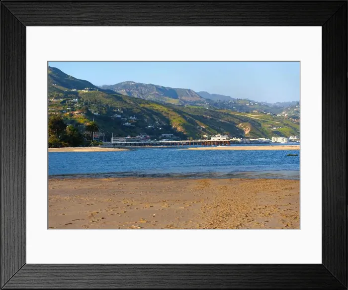 Framed Print : Scenic view of Malibu Pier extending over calm waters with sandy beach and hills in background