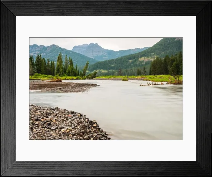 Framed Print : River flowing through a forest and mountain valley in Yellowstone Framed Print : River flowing through a forest and mountain valley in Yellowstone