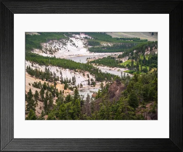 Framed Print : A river winds through a canyon surrounded by lush forest Framed Print : A river winds through a canyon surrounded by lush forest