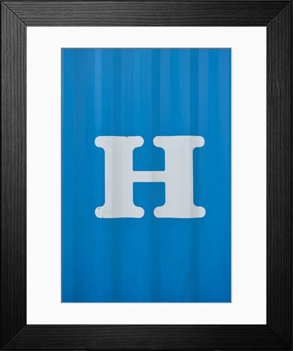 Framed Print : White letter H on blue background Framed Print : White letter H on blue background