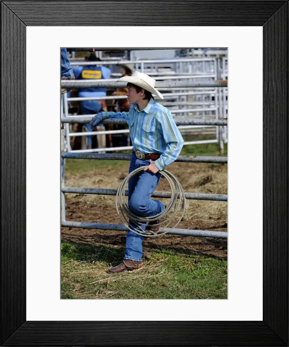 Framed Print : Teen cowboy holding rope Framed Print : Teen cowboy holding rope
