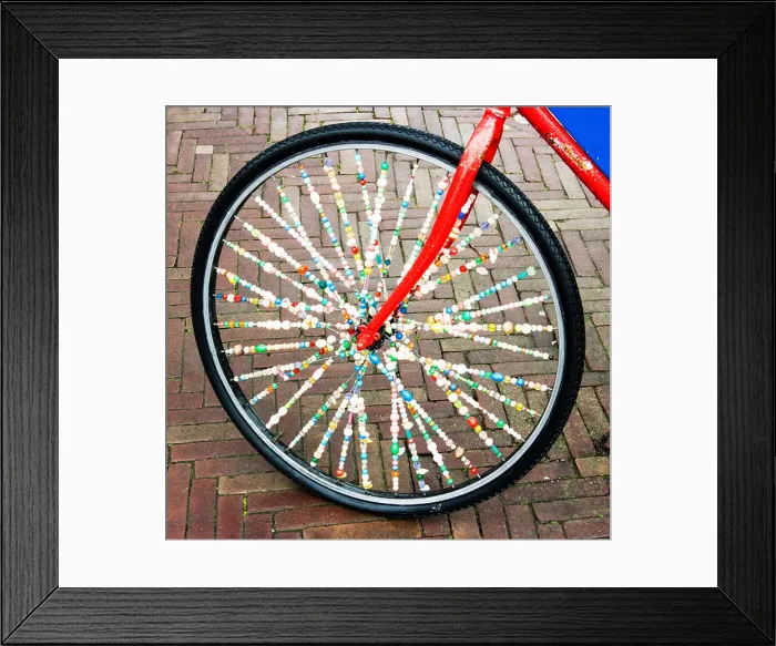 Framed Print : Bicycle wheel with spokes decorated with beds, Holland Framed Print : Bicycle wheel with spokes decorated with beds, Holland