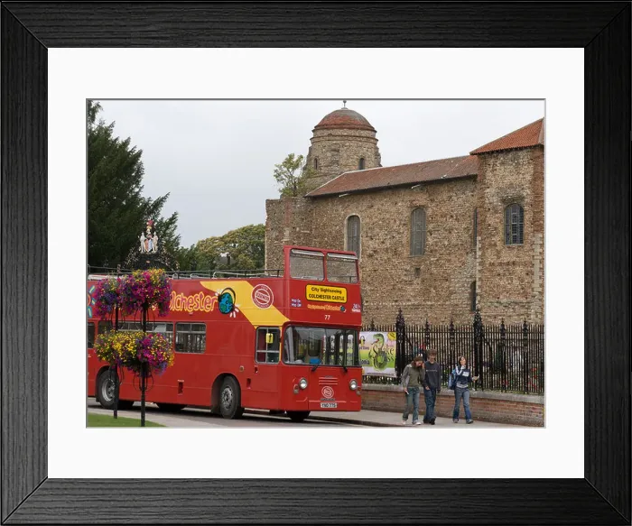 Framed Print : An open top tour bus at the Castle in Colchester which is the largest Norman keep in England Framed Print : An open top tour bus at the Castle in Colchester which is the largest Norman keep in England