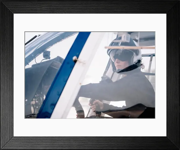 Framed Print : Pilot Woman inside a helicopter Framed Print : Pilot Woman inside a helicopter