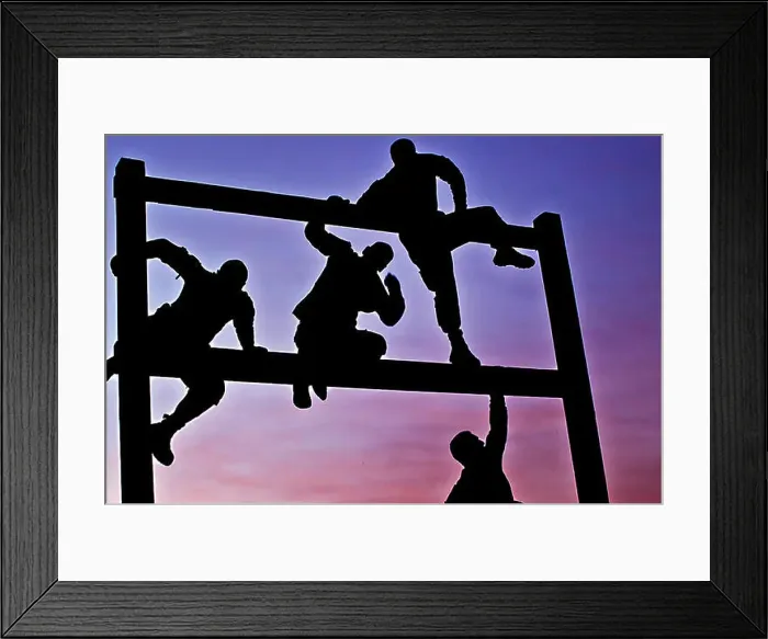 Framed Print : As the sun rises, Soldiers weave through an obstacle course on Camp Taji