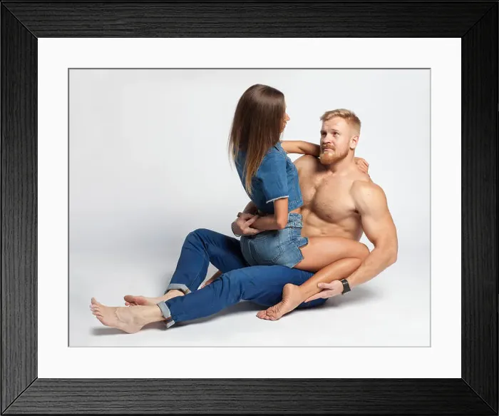 Framed Print : young sexy woman on top brutal young guy with beard isolated on white background Framed Print : young sexy woman on top brutal young guy with beard isolated on white background
