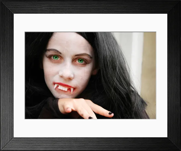 Framed Print : girl dressed up as vampire for halloween Framed Print : girl dressed up as vampire for halloween