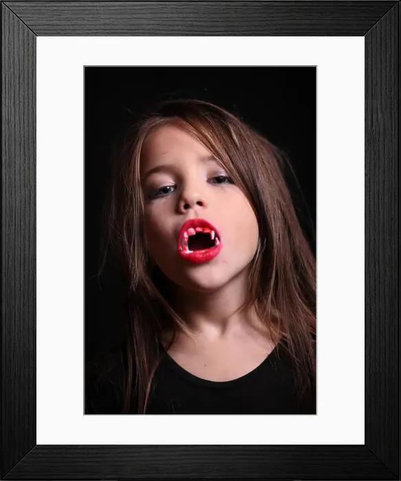 Framed Print : The girl in the image of a vampire for Halloween Framed Print : The girl in the image of a vampire for Halloween