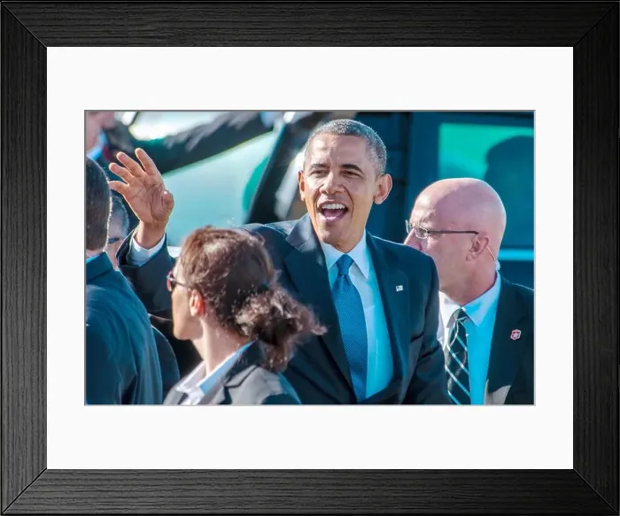 Framed Print : US President Barack Obama waves to the public after arriving at Moffett Federal Airfield on Air Force One June 6 Framed Print : US President Barack Obama waves to the public after arriving at Moffett Federal Airfield on Air Force One June 6